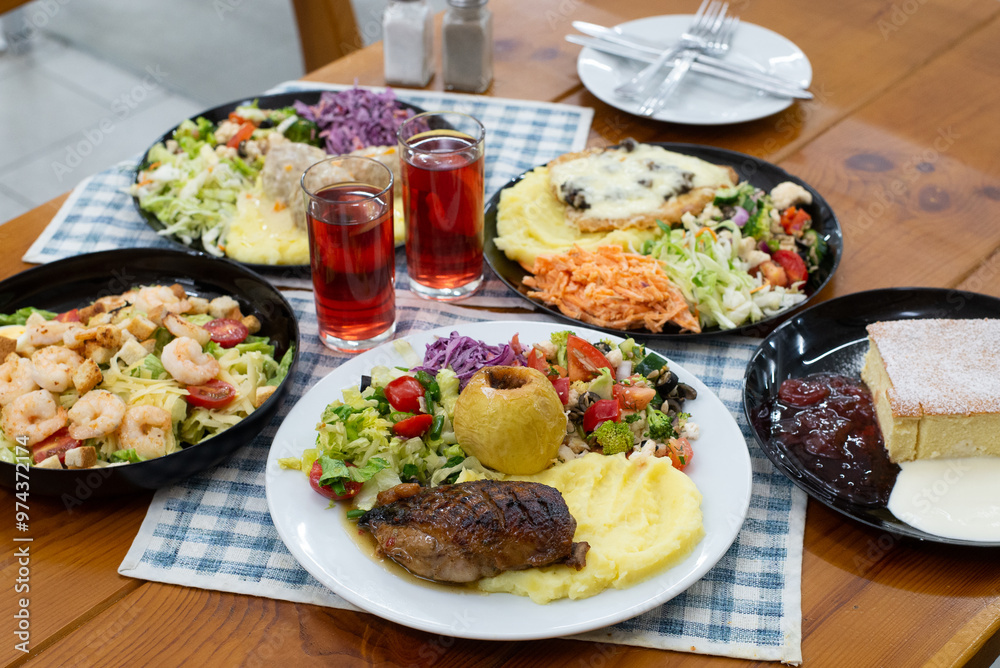 Home made meat dishes dinner time dishes on table ready to eat Home made meat dishes dinner time dishes on table ready to eat