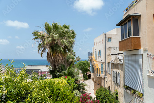 View at old houses of Jaffa neighborhood, Mediterranean sea and Jaffa port during summer. 