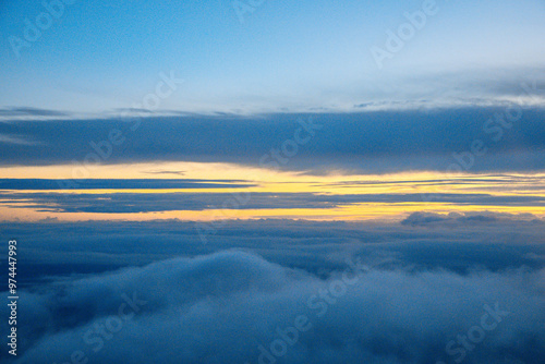 China Shanghai - Sunrise above the clouds from the plane