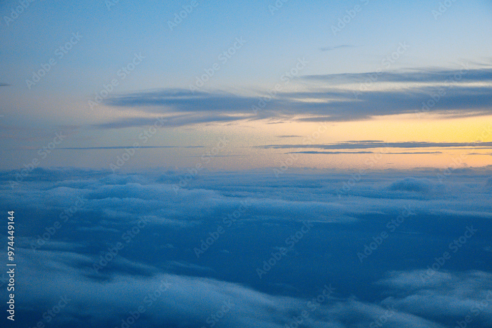 China Shanghai - Sunrise above the clouds from the plane China Shanghai - Sunrise above the clouds from the plane