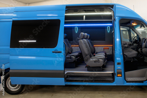 Comfortable interior of a passenger bus with soft seats. The design is made to order. Private covering of cars. Various elements of the bus interior.