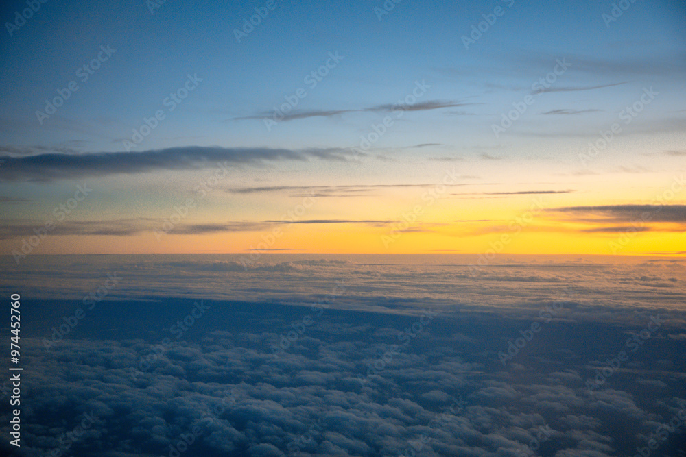 China Shanghai - Sunrise above the clouds from the plane