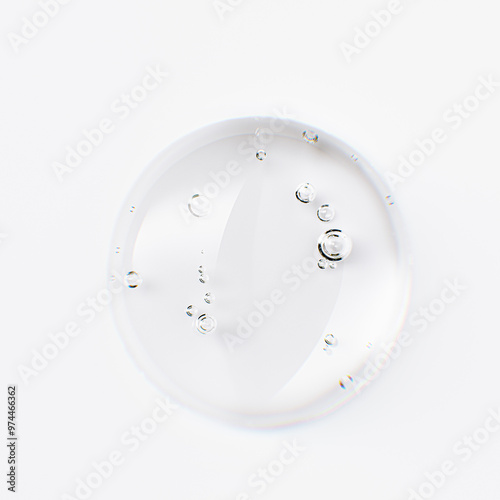 Round drop of transparent cosmetic gel on a white.  Beauty product liquid sample with bubbles 3d rendering