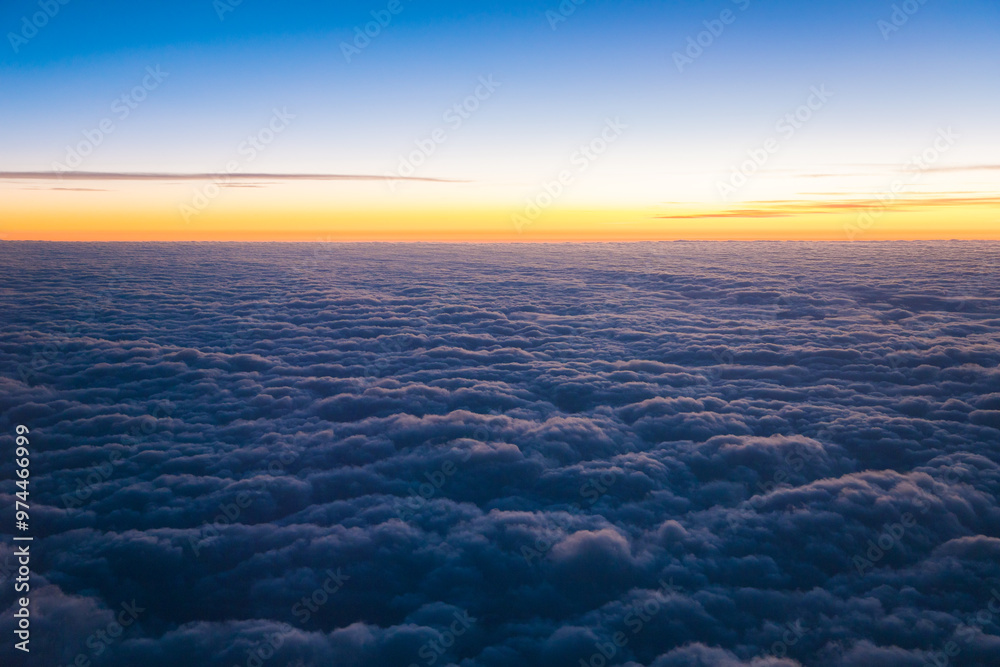 China Shanghai - Sunrise above the clouds from the plane