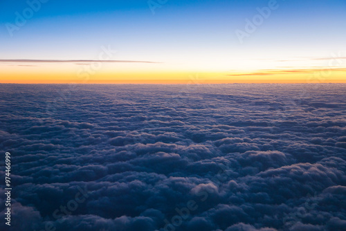 China Shanghai - Sunrise above the clouds from the plane