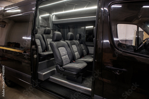 Comfortable interior of a passenger bus with soft seats. The design is made to order. Private covering of cars. Various elements of the bus interior.