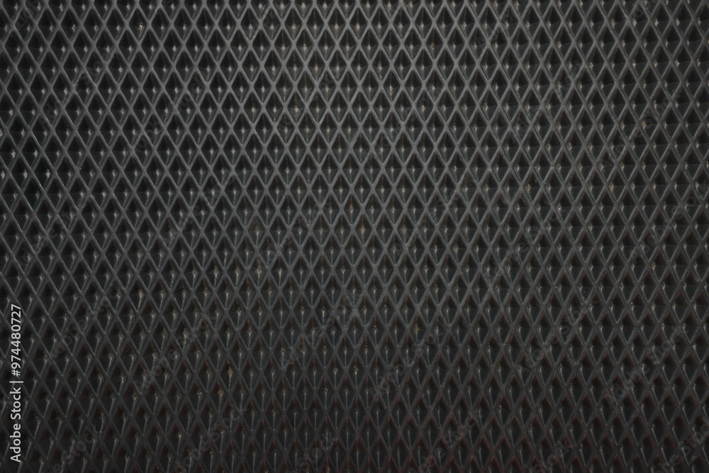 Black rubber car mat as background, top view Black rubber car mat as background, top view