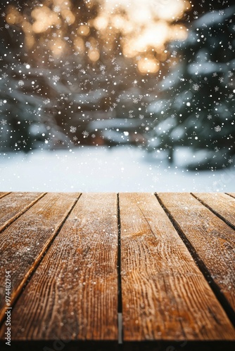 wooden empty table on a snowy winter background. Selective focus