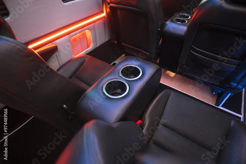 Comfortable interior of a passenger bus with soft seats. The design is made to order. Private covering of cars. Various elements of the bus interior.