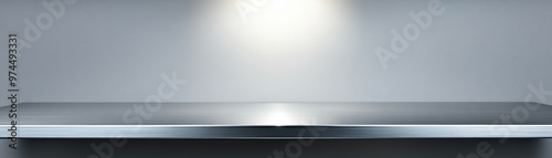 Wallpaper Mural Sleek metallic surface under spotlight, perfect for product display or technology background with modern, futuristic design. Torontodigital.ca