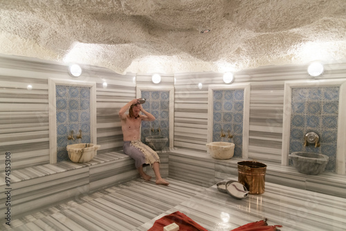 Man Enjoying a Traditional Turkish Bath photo