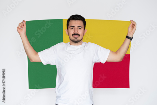 Moustached man holding Benin flag, protest or social issues in Benin, campaigning concept photo