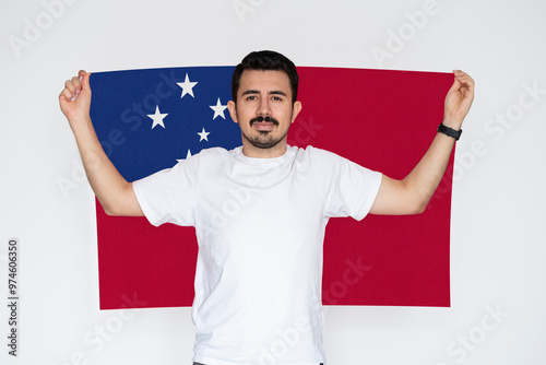 Photography Moustached man holding Samoa flag, patriot and nationalist person, campaigning c