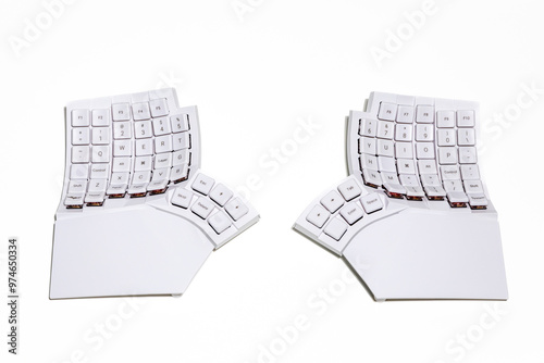 Ergonomic white split keyboard mechanic on an isolated background