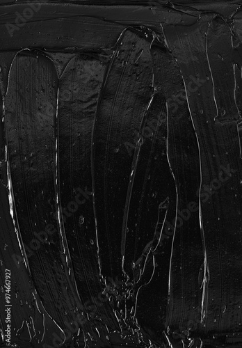 Texture of black acrylic paint. Image is ideal for creative projects, background designs or illustrations where cleanliness and sophistication are required.