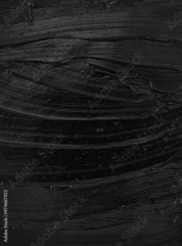 Texture of black acrylic paint. Image is ideal for creative projects, background designs or illustrations where cleanliness and sophistication are required.