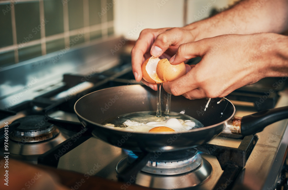Home, hands and chef with eggs for cooking, frying and morning breakfast in apartment kitchen. Culinary, male person and cook with protein food by stove, vitamin A diet and healthy nutrition in pan Home, hands and chef with eggs for cooking, frying and morning breakfast in apartment kitchen. Culinary, male person and cook with protein food by stove, vitamin A diet and healthy nutrition in pan