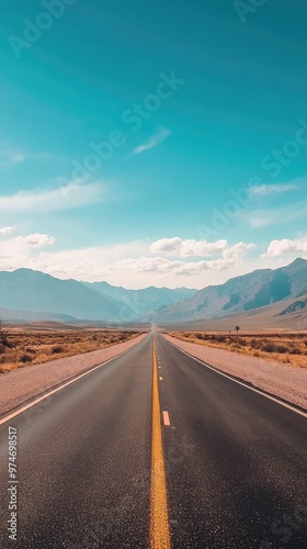 A Deserted Highway Stretching Towards the Horizon, Under a Vast Blue Sky, a Promise of Endless Journey Awaits.