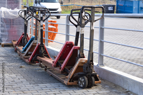 Pallet truck, Hand pallet truck on the warehouse.  Rusty metal machine.