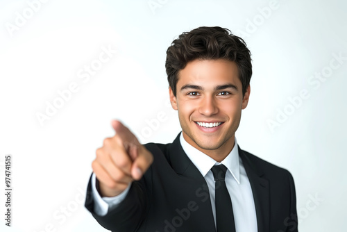 Businessman pointing with his hand smiling to yo over white background