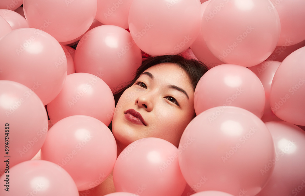 custom made wallpaper toronto digitalA serene woman immersed in numerous pink balloons, evoking a sense of beauty, tranquility, and relaxation.