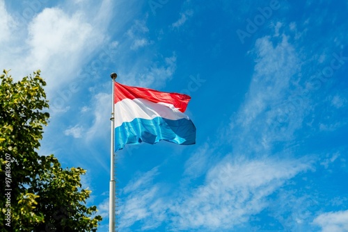 Bild auf Leinwand The Luxembourg flag features three vertical bands of blue, white, and red, symbolizing liberty, equality, and fraternity