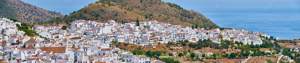 Drone, city and outdoor to travel in Spain, Europe summer and mountains for peace in town. Buildings, architecture and culture in Frigiliana for tourism, holiday and calm environment on vacation Drone, city and outdoor to travel in Spain, Europe summer and mountains for peace in town. Buildings, architecture and culture in Frigiliana for tourism, holiday and calm environment on vacation