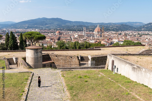 Young woman strolling through the Forte di Belvedere. Florence, Tuscany. photo