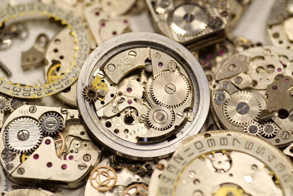 Old mechanical watches with gears and cogs. Watch or clock mechanisms Old mechanical watches with gears and cogs. Watch or clock mechanisms