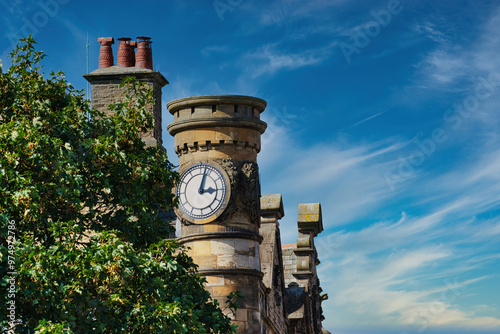 Historic Clock Tower Against a Blue Sky in Harrogate, UK