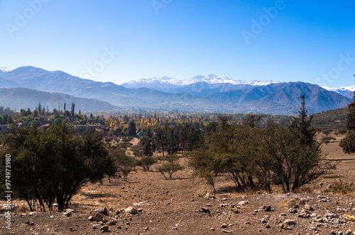 View from the Santa Teresita rising road in Lo Barnechea towards Lo Barnechea's plateau, Santiago, Chile photo