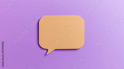 Photo of a speech bubble cut out from light brown cardstock, placed on a bright purple background. Craft speech bubble design.