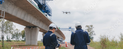 Wallpaper Mural Engineer surveyor team Use drone for operator inspecting and survey construction site. Surveyors or explorer use drones to view construction sites or check security Torontodigital.ca