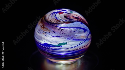 Real Handmade Colorful Glass Sphere Turning photo