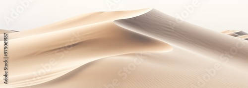 A vast desert landscape featuring rolling sand dunes and distant mountains under a clear blue sky.