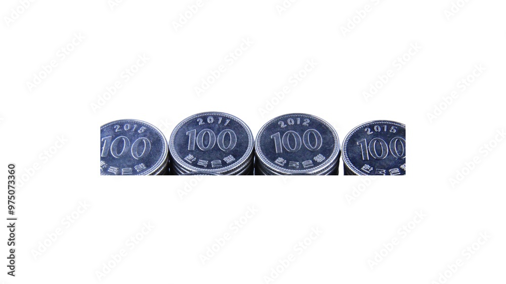 South Korean 100 won coins isolated on white background. South Korean 100 won coins isolated on white background.