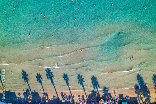 Kusadasi, Aydin, Turkey. Ladies Beach (Turkish: Kadinlar Denizi) in Kusadasi. Touristic beach resort town on Turkey. Aerial view of Kusadasi. photo