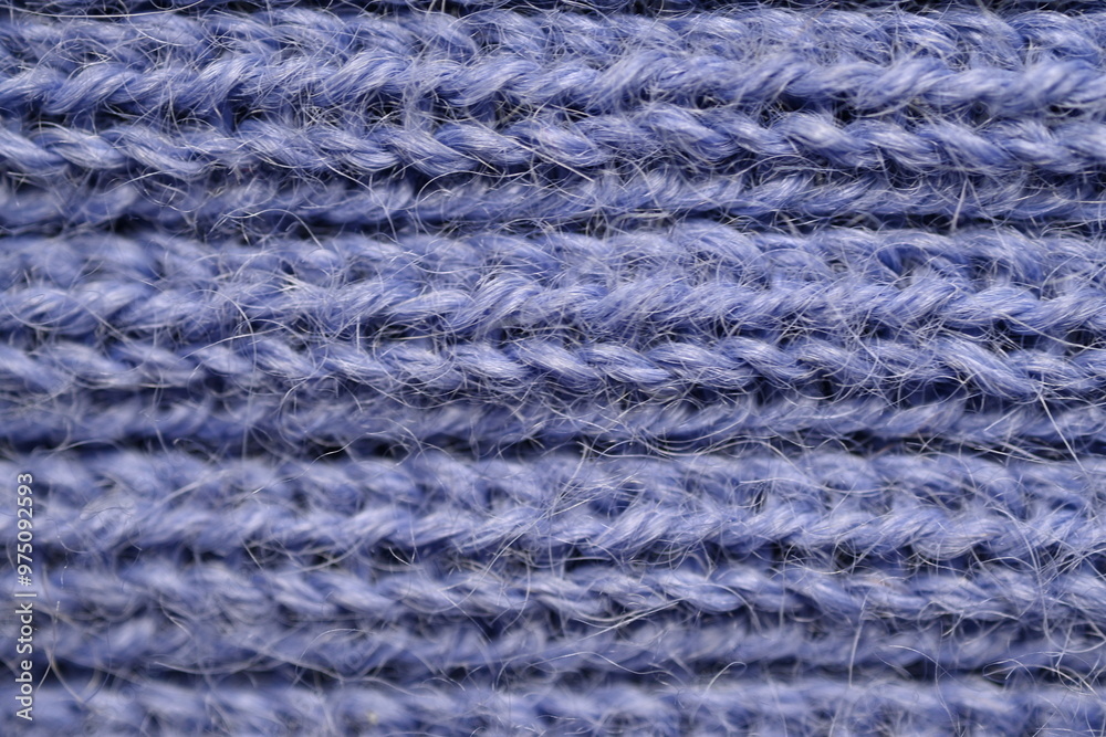 macro texture of purple crocheted sweater as a background, close-up of purple crocheted front surface, woolen texture of alpaca wool crocheted macro texture of purple crocheted sweater as a background, close-up of purple crocheted front surface, woolen texture of alpaca wool crocheted