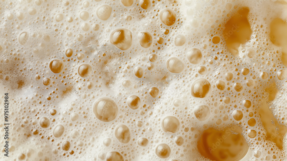 a close-up, top-down view of yeast fermentation foam, filling the entire frame with the focus on the frothy, bubbling surface of fermenting liquid a close-up, top-down view of yeast fermentation foam, filling the entire frame with the focus on the frothy, bubbling surface of fermenting liquid