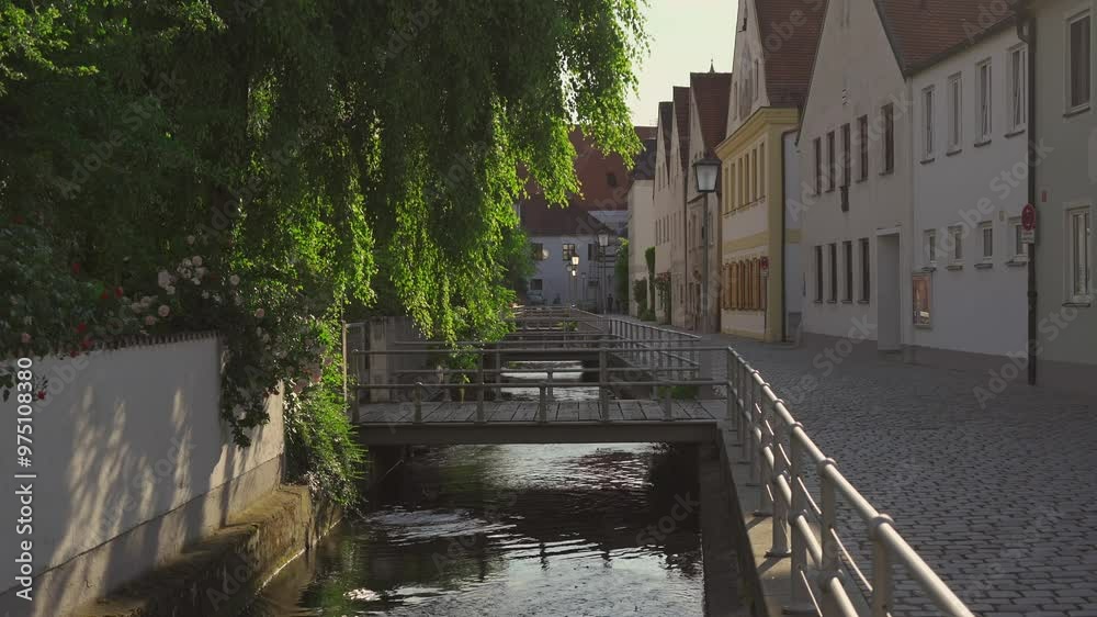 Old historic town Freising and their canals on the River Isar in Bavaria, Germany. Freising is city in Deutschland, regional center, located in Bayern. Water canals in an ancient Eupropean city. 