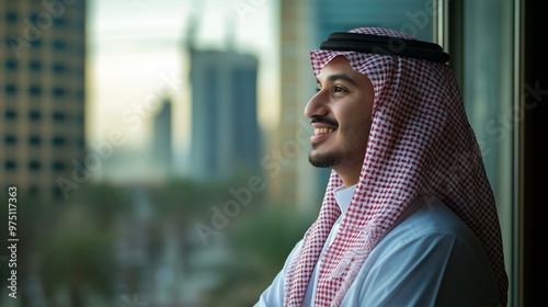 successful arab saudi man looking to skylines side view