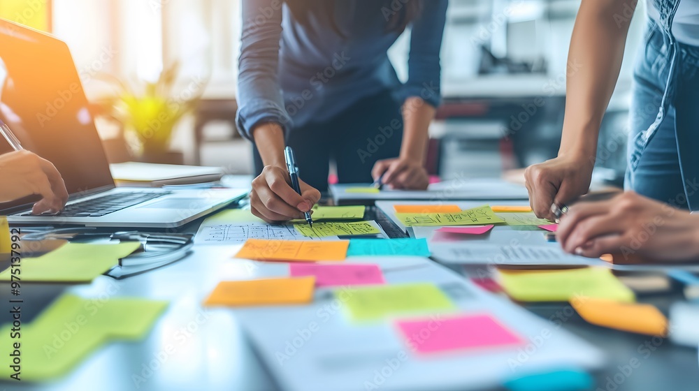 Dynamic collaboration in a professional workplace: Creative brainstorming and project management, colourful sticky notes.
Dynamic collaboration in a professional workplace: Creative brainstorming and project management, colourful sticky notes.