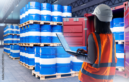Woman in fuel warehouse. Gi...