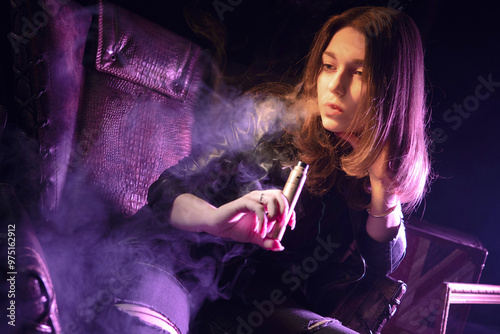 Woman with electronic cigar...