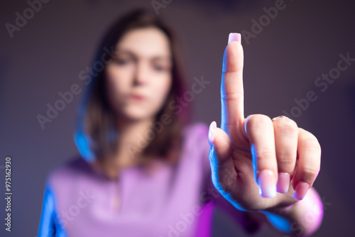 Business woman touches scre...