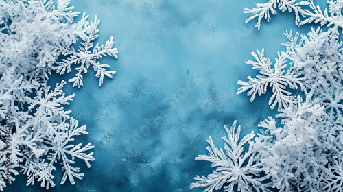 White Frosty Snowflakes on a Blue Background