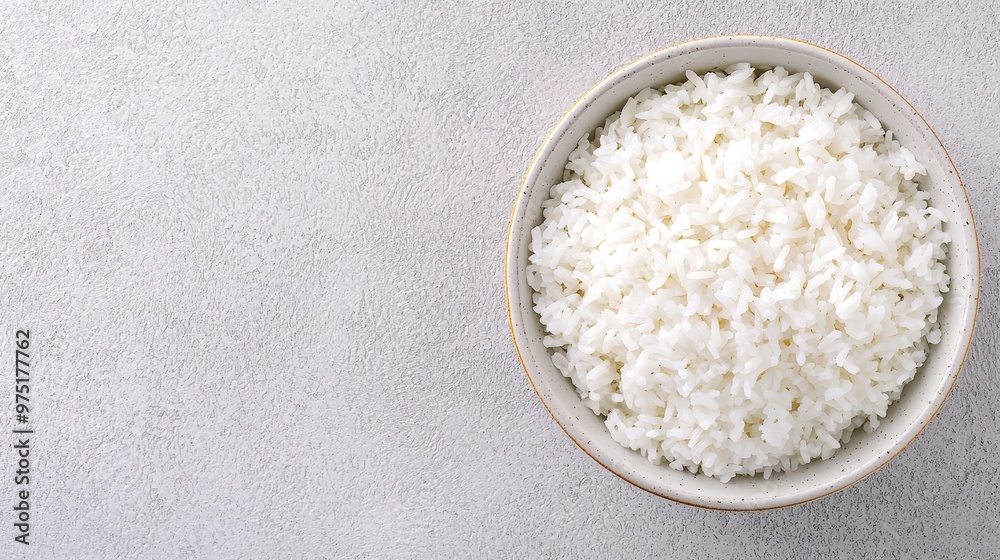 Cooked White Rice in Bowl Top View Grey Background Cooked White Rice in Bowl Top View Grey Background