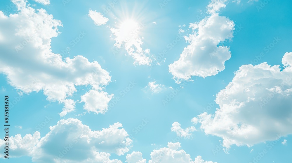 Blue Sky with Fluffy White Clouds and Sun Blue Sky with Fluffy White Clouds and Sun