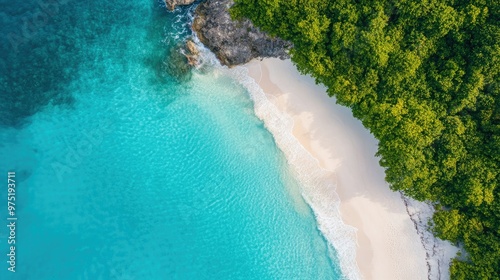 Drone view of a stunning tropical beach with crystal clear water 