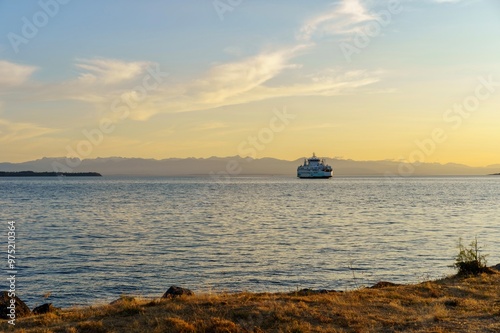 BC Ferries boat travelling at sunset